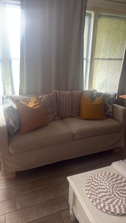 Small white cream sofa