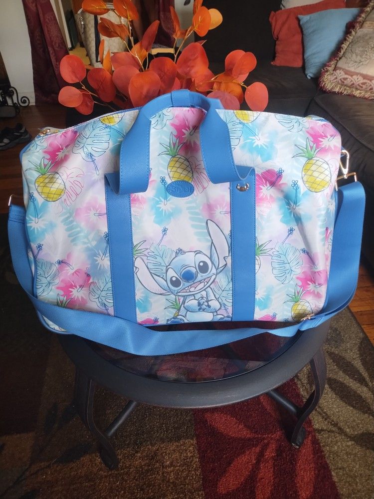 Disney Stitch Blue Rolling Luggage Duffle Bag Weekender BioWorld 20x12x11 NWT