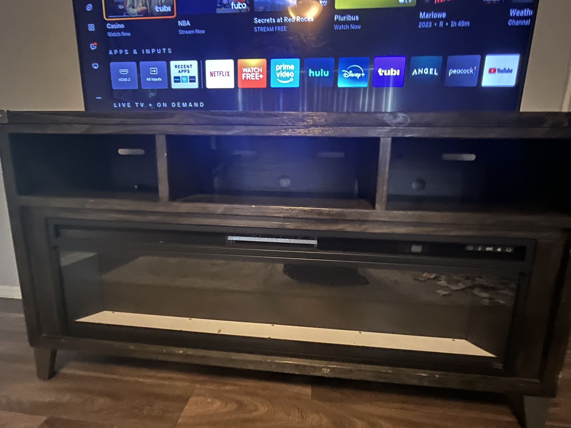 Tv Stand And Tv With Sound Bar And Subwoofer