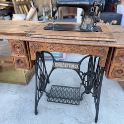 Antique Singer Sewing Machine with Ornate Wood Table With Cast Iron Base