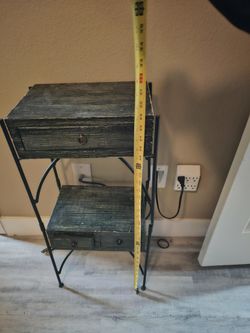 Black metal accent table OBO