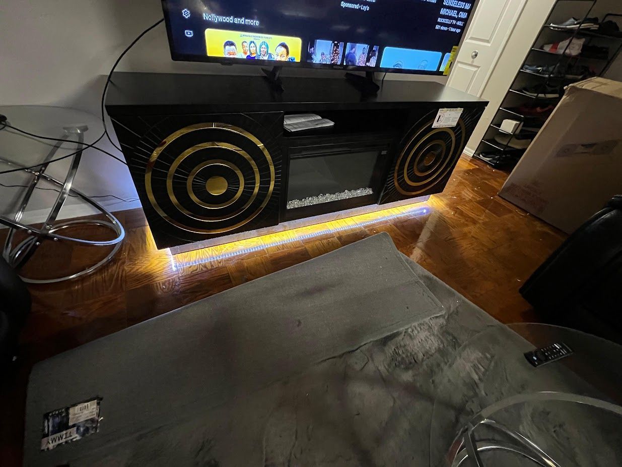 New in box TV714 black color tv stand with LED lights and fireplace insert