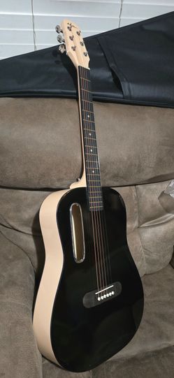 GUITARRA ACOUSTICA TAMAÑO 3/4 $99 OBO NUEBA
