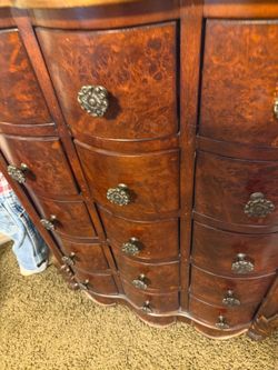 Cabinet, perfect wood like new fifteen drawers. Everything's perfect on it very heavy
