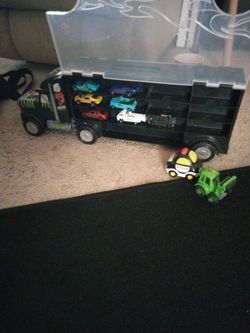 Carry all for 24 cars. 7 included with 2 small cars!