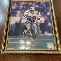 Emmit Smith Autographed 8x10. NFL Hologram