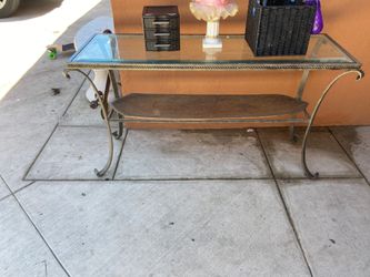 Glass table consoles