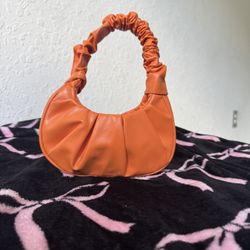Orange mini hand bag