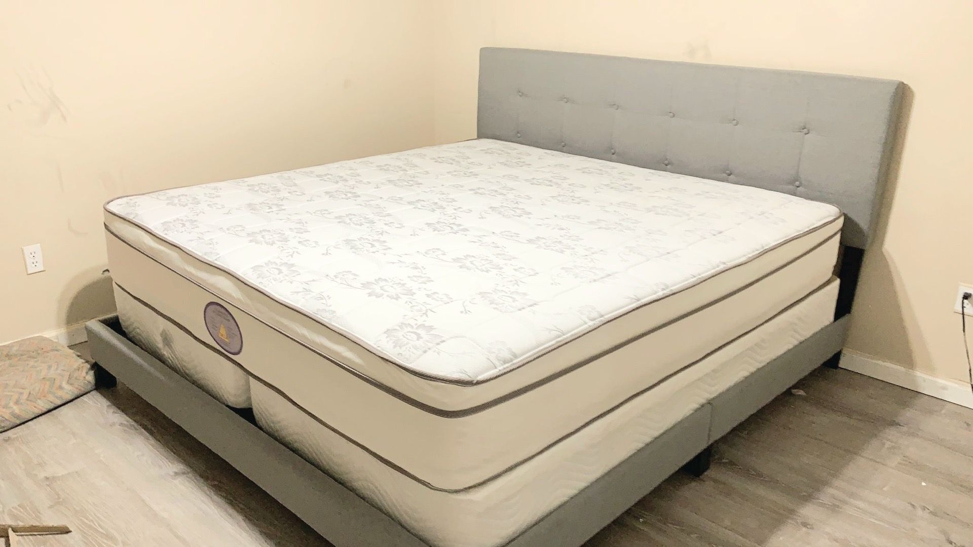 New king mattress and box springs bed frame is not included