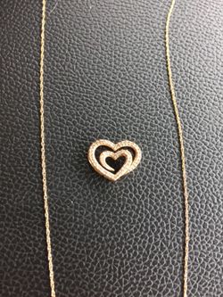 Authentic 14k rose gold chain and diamond heart pendant