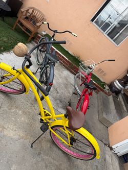 Yellow Beach Cruiser Bicycle with Pink Tires