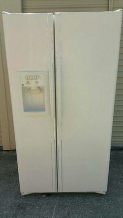 Ge white side by side refrigerator