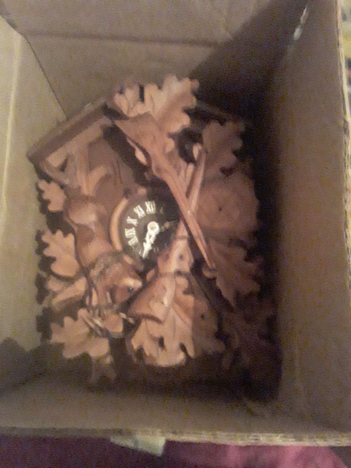 antique coocoo clock in original box with directions still need to put togeather