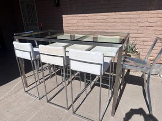 This Lumisource Fuji stainless steel bar height, glass table. $700