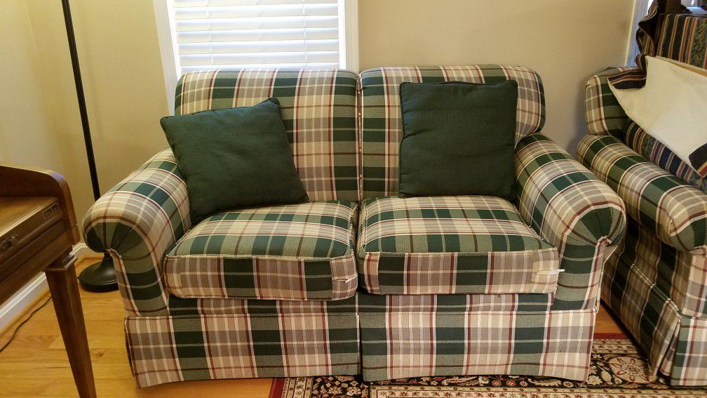 Plaid loveseat with matching sofa and throw pillows. $100 obo.