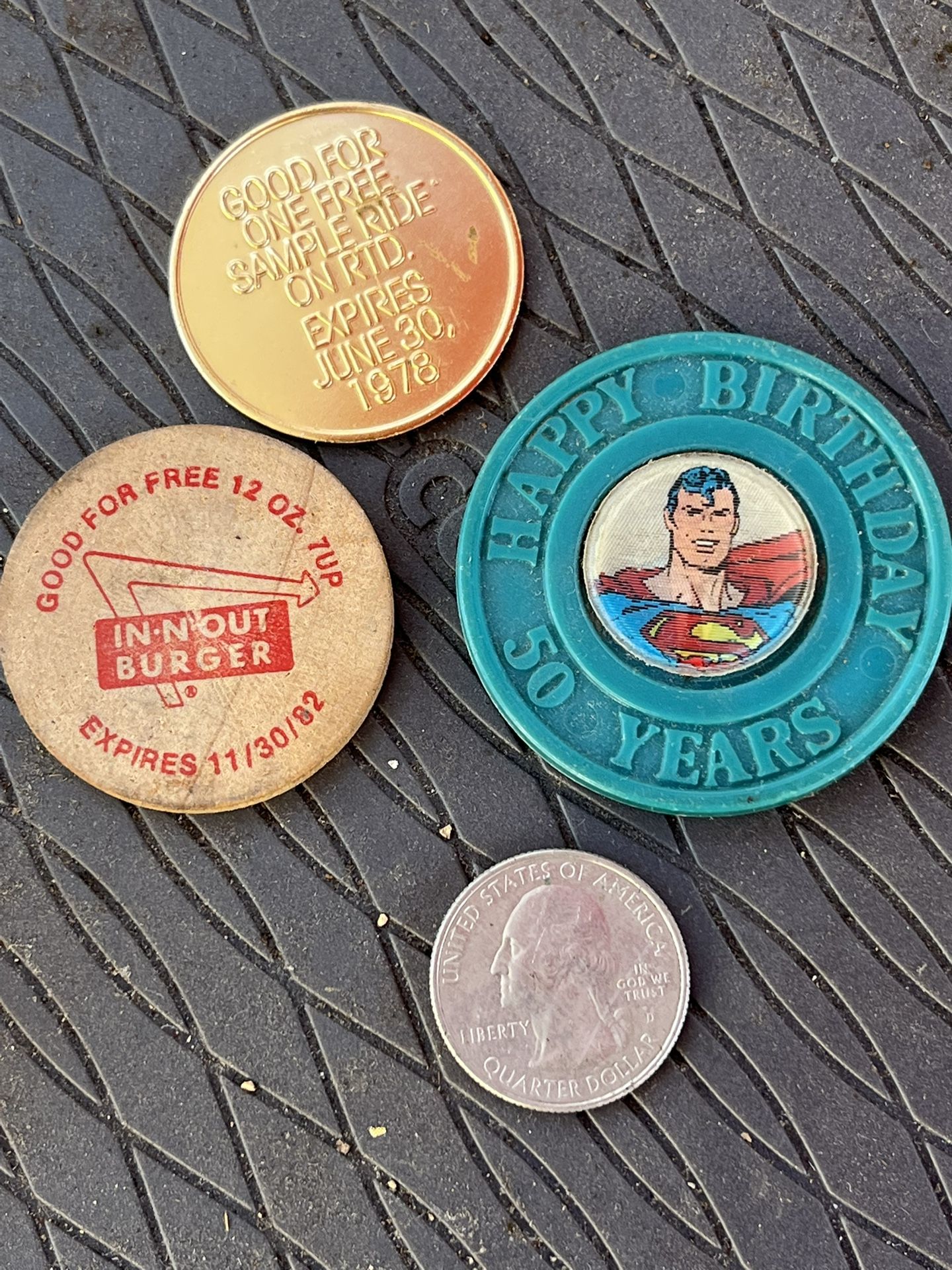 Vintage Token & Coin Lot – 1970s–1980s Superman, In-N-Out, 7UP & RTD Souvenir Tokens  Set of four fun collectible tokens from the late 1970s to early 