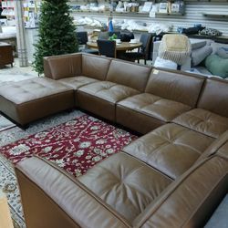 Abbeyson Wallingford 7-piece Leather NModular Sectional with Ottoman