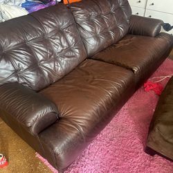 Leather sofa W/recliners 