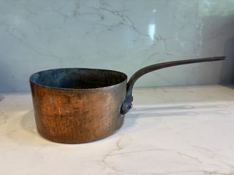 Rugged antique French copper saucepan