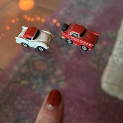 2 Small Micro Machines 1956 Ford Thunderbird in Red. It is made of plastic and is highly detailed, Note the spare tire. 