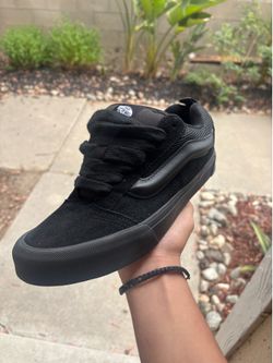 All black Knu Skool Vans