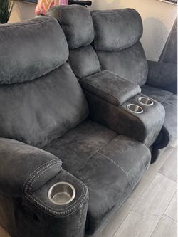 Dark gray reclining loveseat