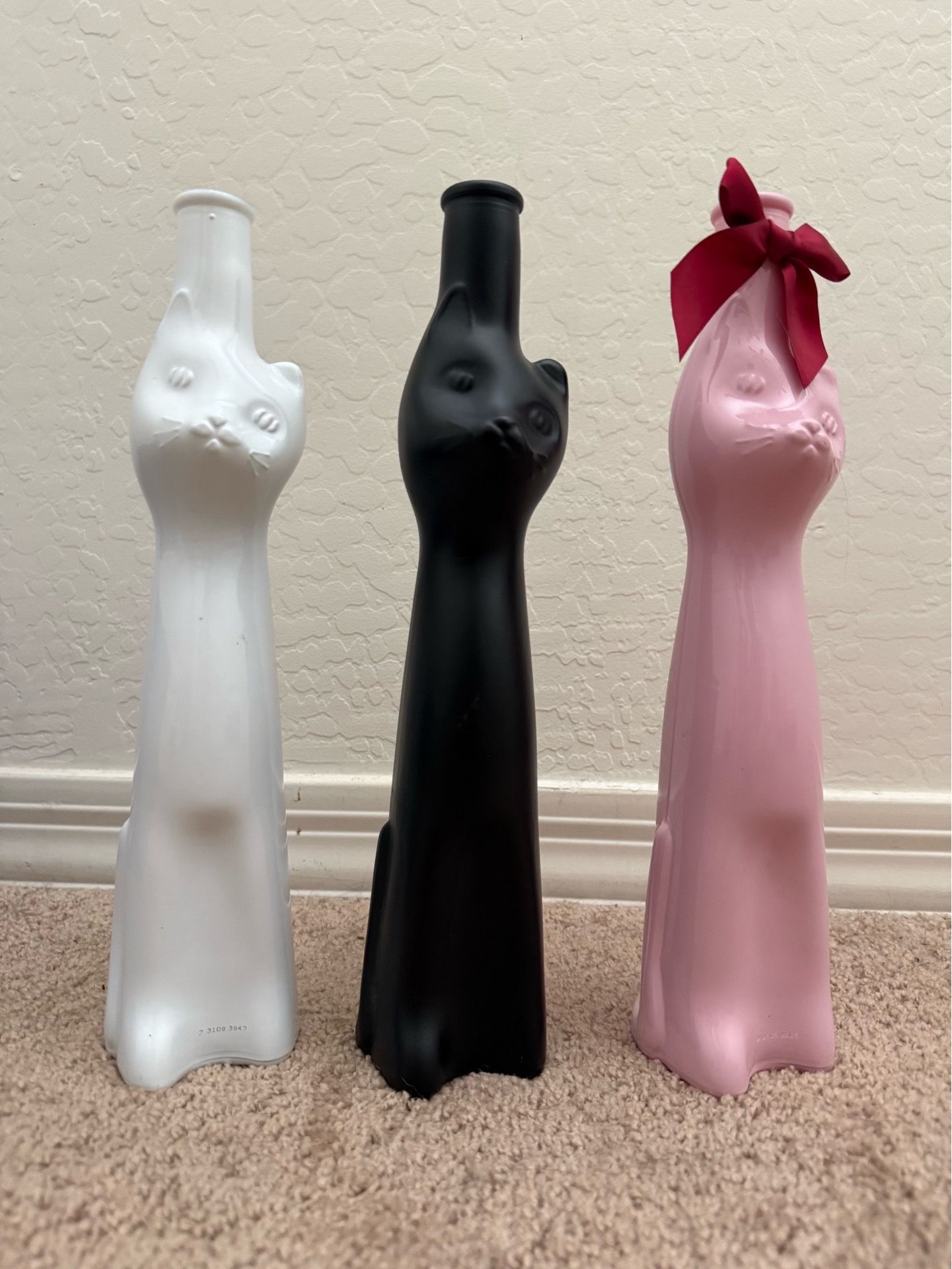 Cat wine bottles