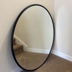 Large round mirror