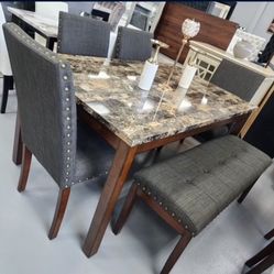 Dining Room Set With Faux Marble Top And Grey Chairs With One Bench 