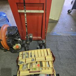 2 Fishing Poles And A Full Tackel Box