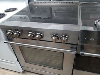 Beko stainless steel induction glasstop slide-in range - Free delivery