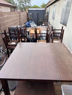 Dining Table and 8 chairs with expanding leaf