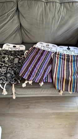 Drawstring fabric backpacks (100)