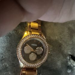 Woman’s Fossil Rose Gold Watch With Stainless Steal Back And A Silver Water Proof Silver Fossil Watch With Stainless Back 