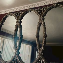 Three ring antique mirror
