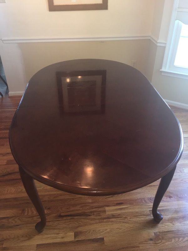 Cherry wood oval dining table