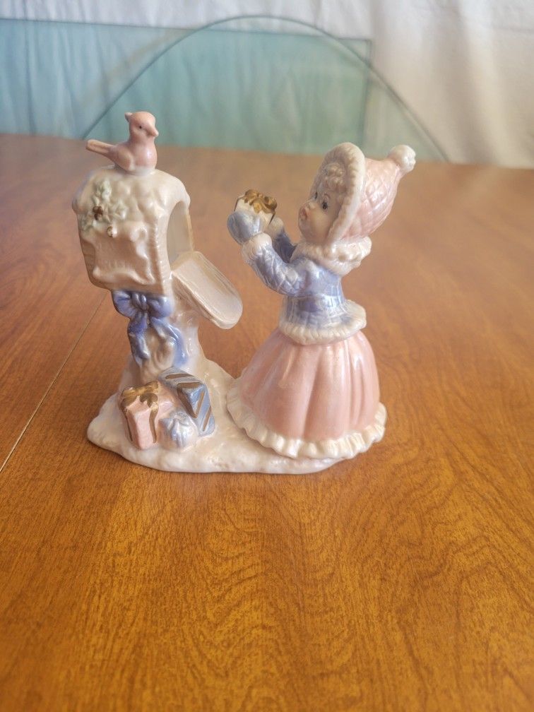 Vintage Girl Sending Christmas Gift Figurine