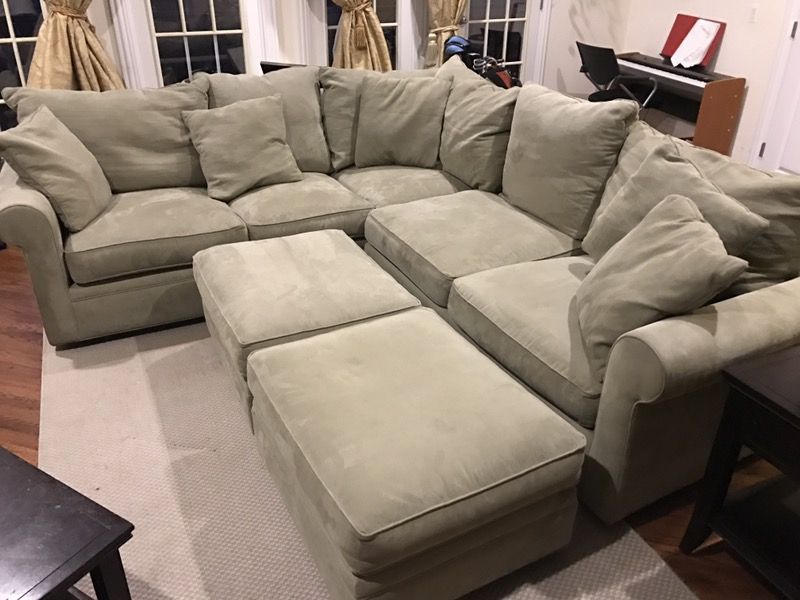Macy's Modern Concepts Astra Sectional with Two rolling Ottomans