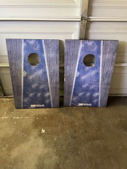 Cornhole board set with bean bags.