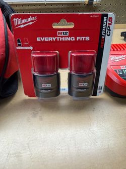 Milwaukee M14 batteries and chargers
