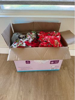 Box of toddler boy holiday clothes