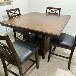 Dining Table - 4 chairs and built in storage compartment