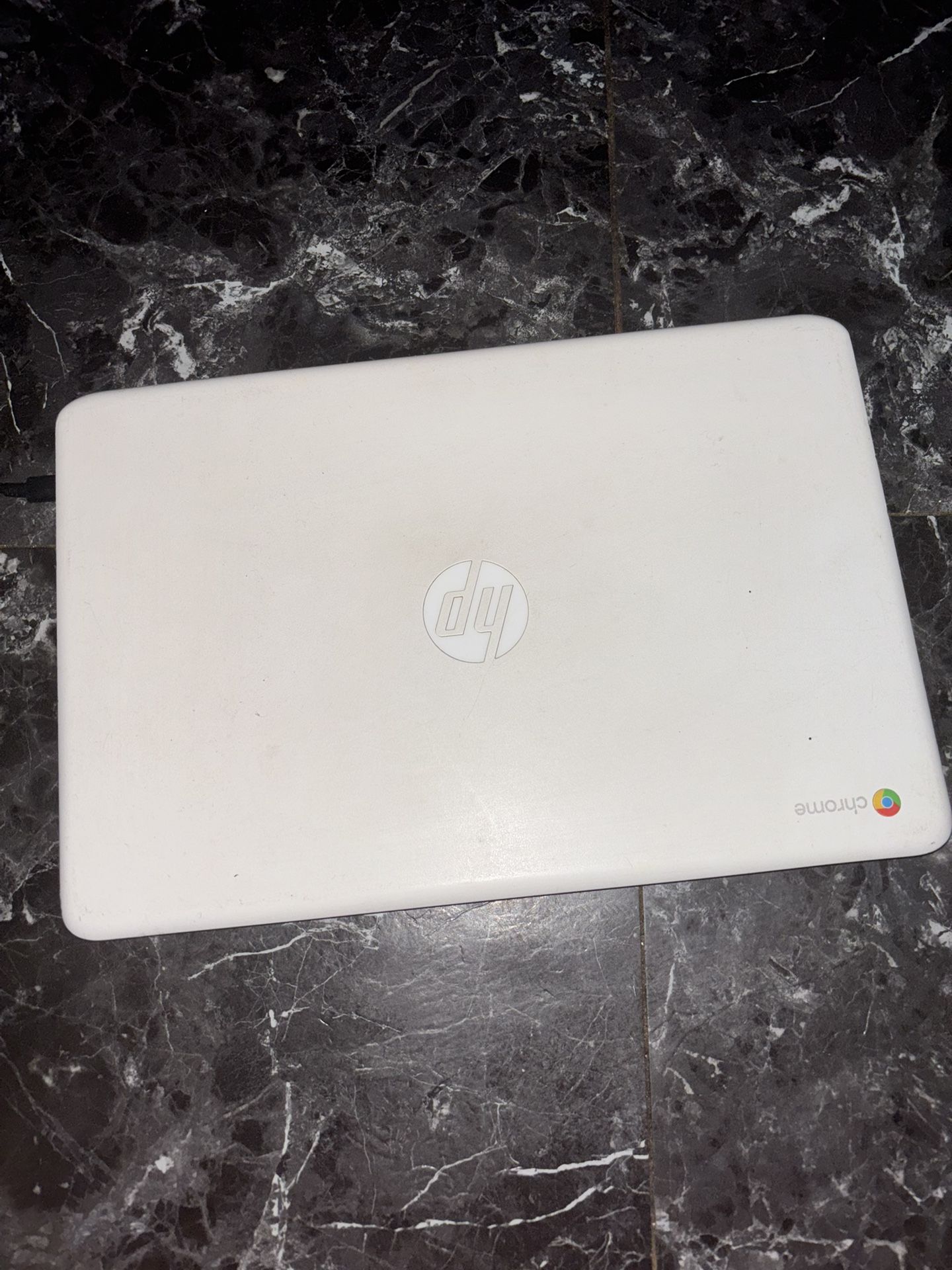 Microsoft Mouse And A Chromebook Computer