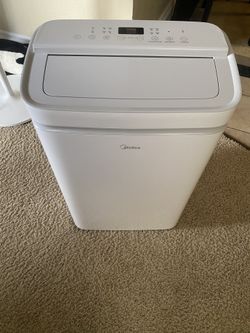 Midea 14000 Btu With Dehumidifier and Fan Mode.
