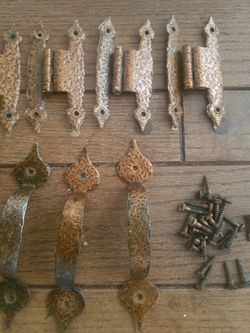 Vintage kitchen cabinet hardware. Hinges and handles
