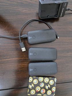 Lot of 4 Portable Power Banks with Battery Charger