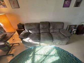 Couch with electric recliners built in