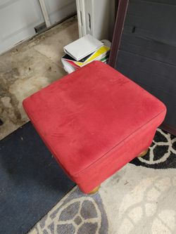 Two items. One covered stool.