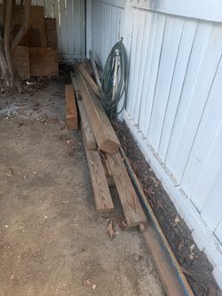 FreeAssorted Lumber Lot – Must Take All Large assortment of used lumber in various sizes and lengths, including 2x4s and larger dimensional lumber. M