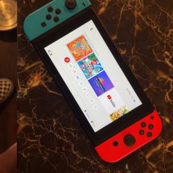Nintendo Switch, JoyCons, Docks, and game